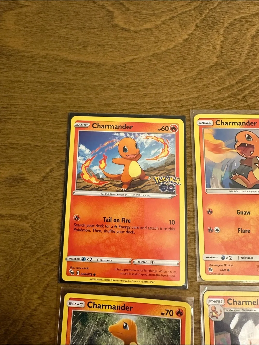 Lot of 4 Charmander and Charmeleon Pokemon Cards NM